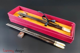 Set of 2 pairs of oval rosewood chopsticks with silver-rimmed snail with chopstick holders